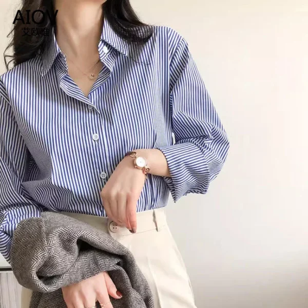 Blusa feminina listrada, manga bufante e gola alta. - Imagem 2
